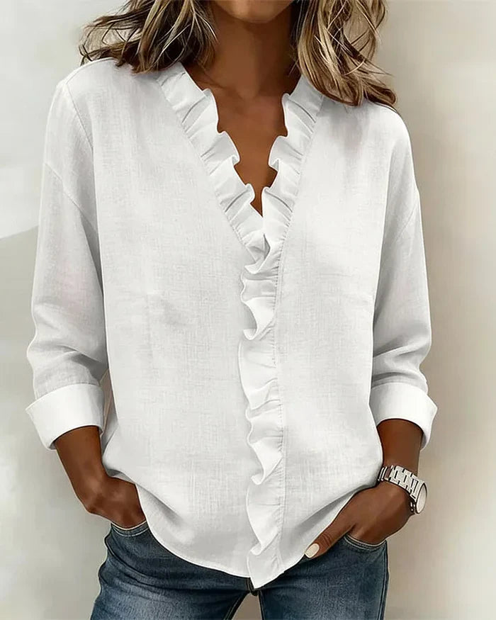 Mari | Elegante top con cuello en V y volantes