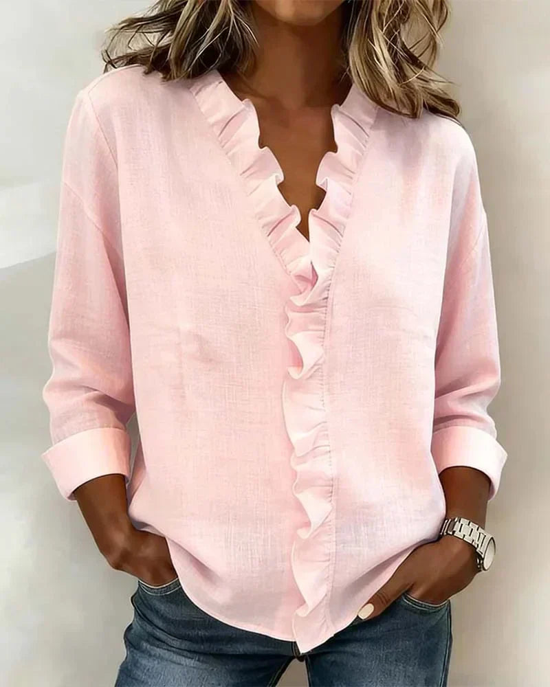 Mari | Elegante top con cuello en V y volantes