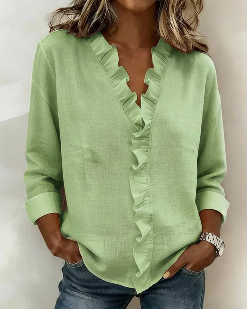 Mari | Elegante top con cuello en V y volantes
