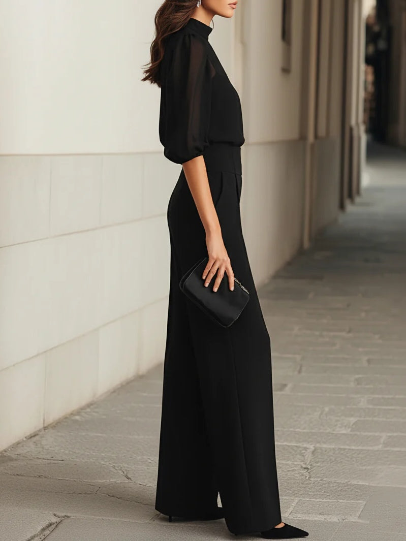 Valentina • Conjunto de tres piezas negro, compuesto por una camisola transparente y pantalones de pierna ancha.