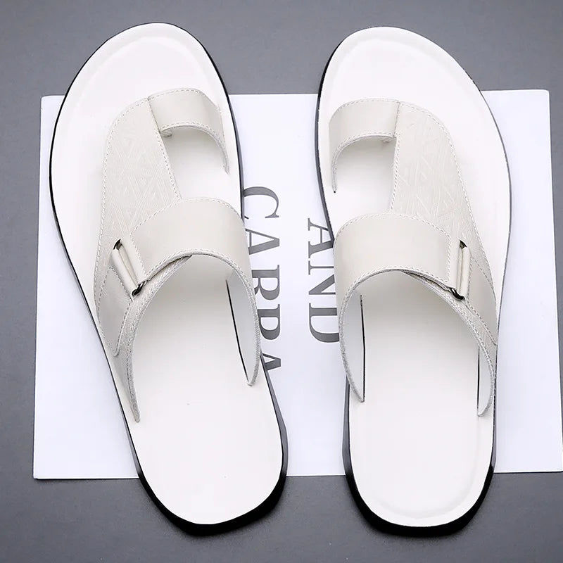 ASTON | Sandalias de piel con tira entre los dedos